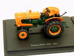 EARLY MODEL DIECAST TRACTORS ON BASE