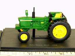 EARLY MODEL DIECAST TRACTORS ON BASE