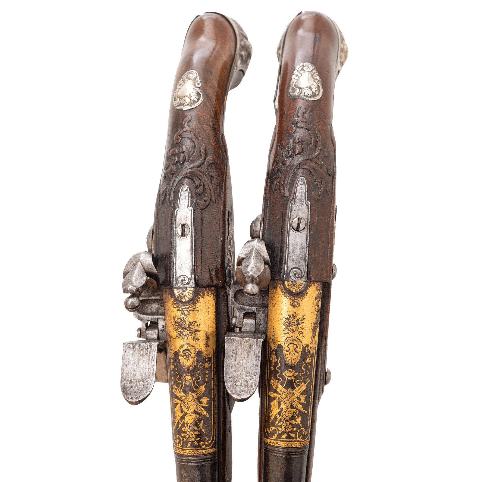 Pair of French Silver Mounted Flintlock Officers Pistols by Jean Seuts (Seux) circa 1785