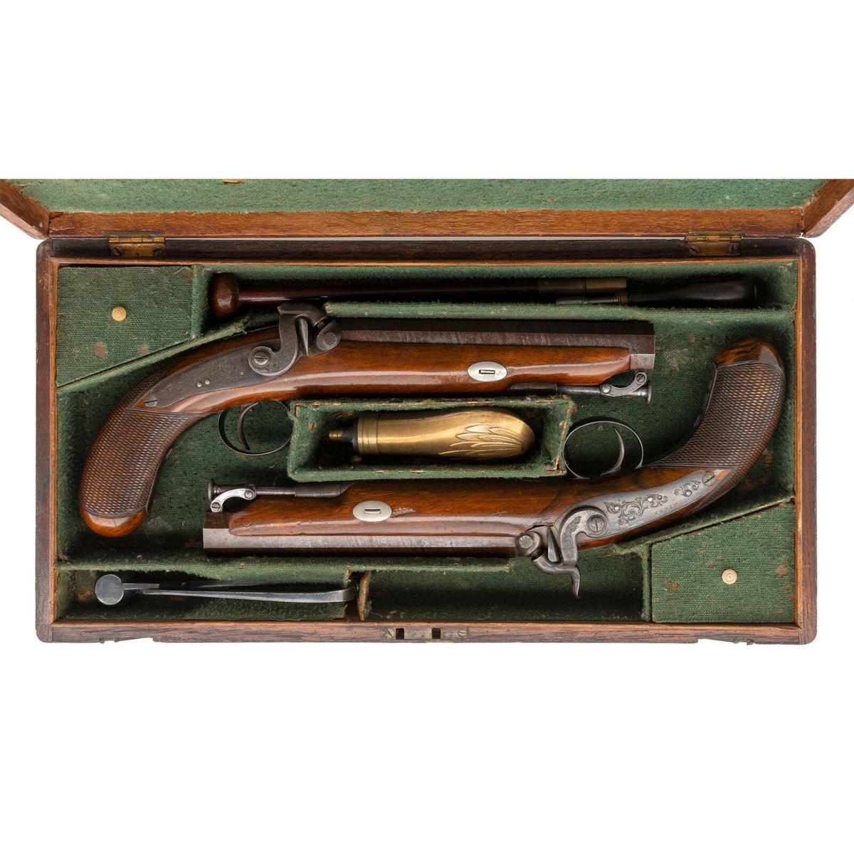 Cased Pair of Carbine Bore Percussion Pistols by Rigby