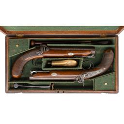Cased Pair of Carbine Bore Percussion Pistols by Rigby