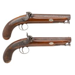 Cased Pair of Carbine Bore Percussion Pistols by Rigby