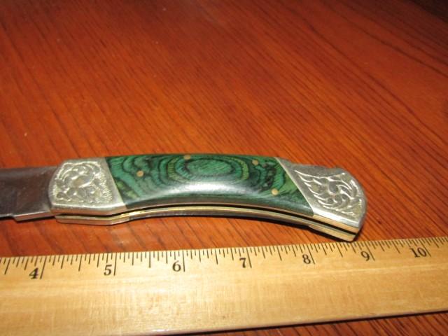 Large Folding Pocket Knife W/ Marbled Handles And Fancy Metal Work