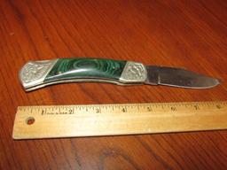 Large Folding Pocket Knife W/ Marbled Handles And Fancy Metal Work