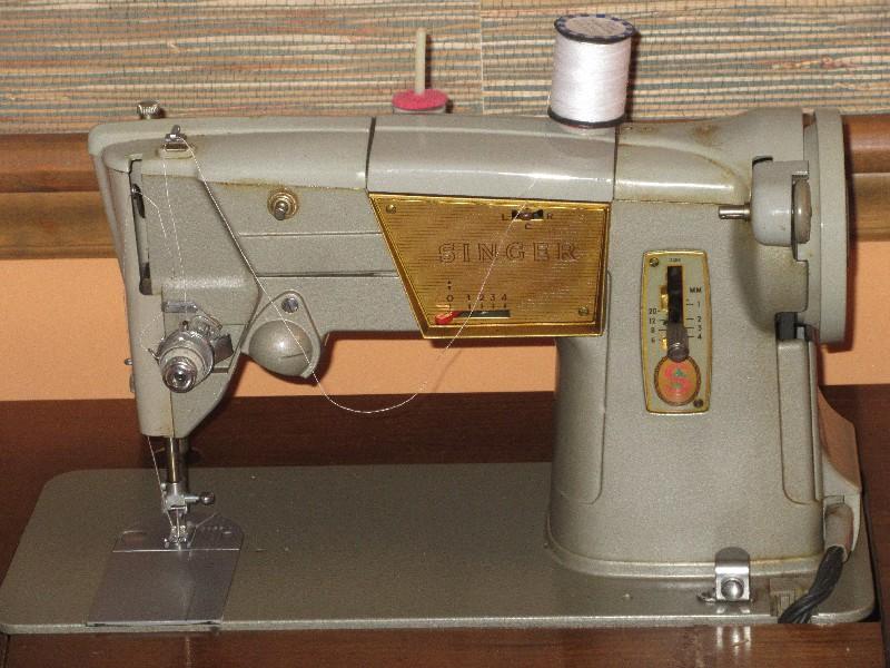 Vintage Green Singer Sewing Machine in Cabinet, Powers on Needle/Feed Move Cabinet
