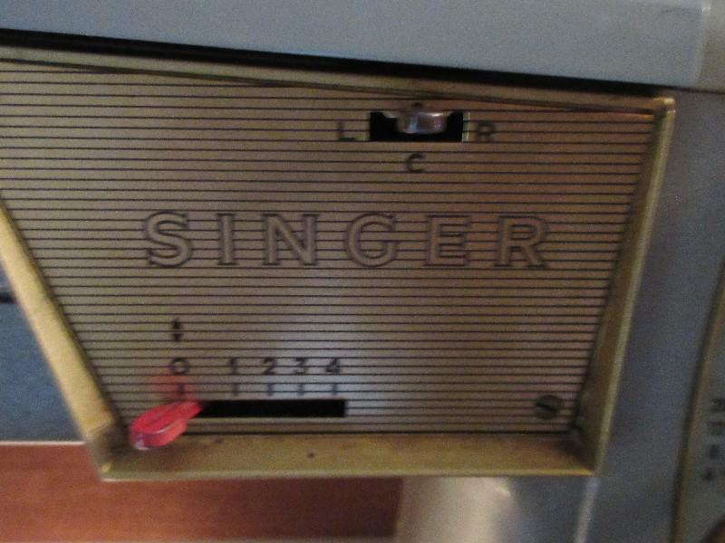 Vintage Green Singer Sewing Machine in Cabinet, Powers on Needle/Feed Move Cabinet