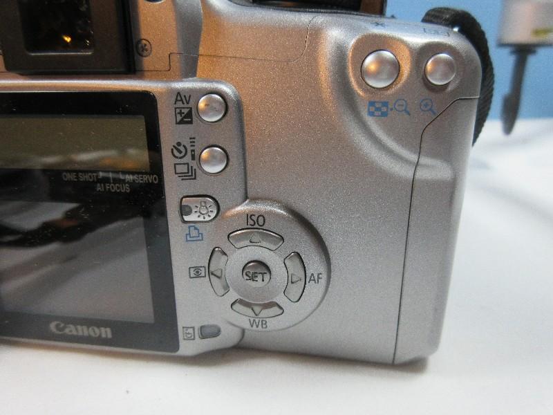 Canon EOS Digital Rebel XT w/Built-In Flash,2 Zoom Lens,Filter,Battery,Charger,Tripod & Bag