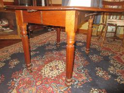 Exceptional Antique Drop Leaf Federal Style Table Turned Reed Baluster Legs on Casters