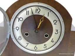 ENGLISH 8 DAY MANTLE CLOCK WITH TIME AND STRIKE. MEASURES 9"T X 9.75"W RETAIL PRICE $150