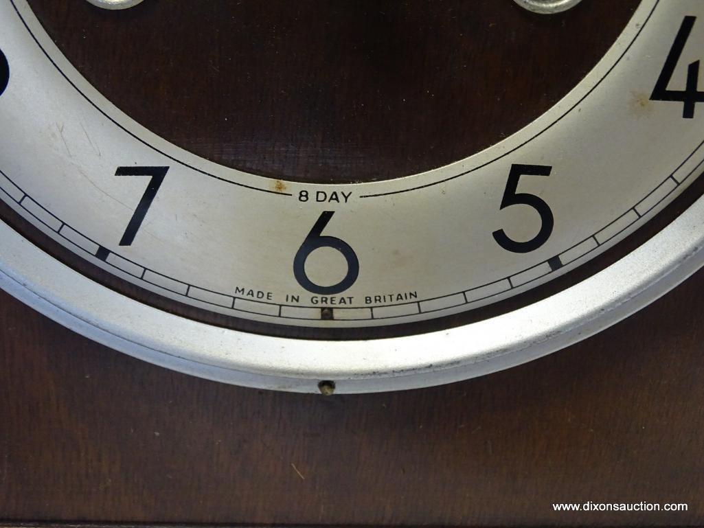 ENGLISH 8 DAY MANTLE CLOCK WITH TIME AND STRIKE. MEASURES 9"T X 9.75"W RETAIL PRICE $150