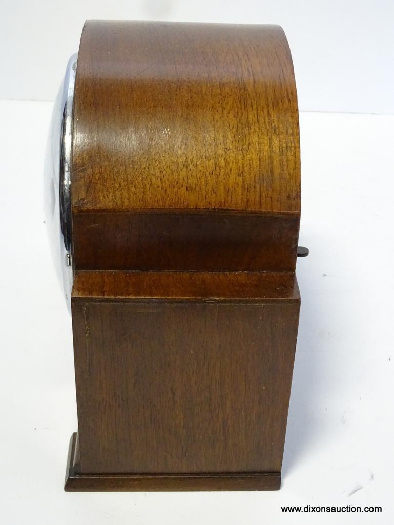 ENGLISH 8 DAY MANTLE CLOCK WITH TIME AND STRIKE. MEASURES 9"T X 9.75"W RETAIL PRICE $150