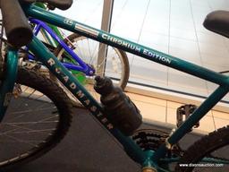 ROADMASTER BIKE; TURQUOISE MENS 26 IN DIA SPE15 CHROMIUM EDITION MOUNTAIN BICYCLE WITH A SADDLE SEAT