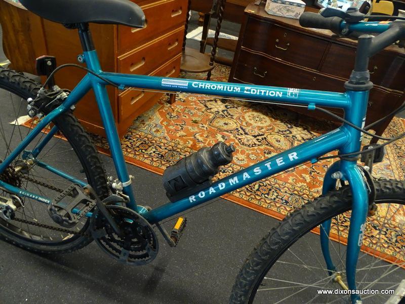 ROADMASTER BIKE; TURQUOISE MENS 26 IN DIA SPE15 CHROMIUM EDITION MOUNTAIN BICYCLE WITH A SADDLE SEAT