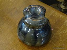 LOT OF 3 INSULATORS; 1 BROWN IN COLOR AND IS MADE BY THOMAS, 1 IS MADE BY HEMINGRAY, AND 1 COBALT IN