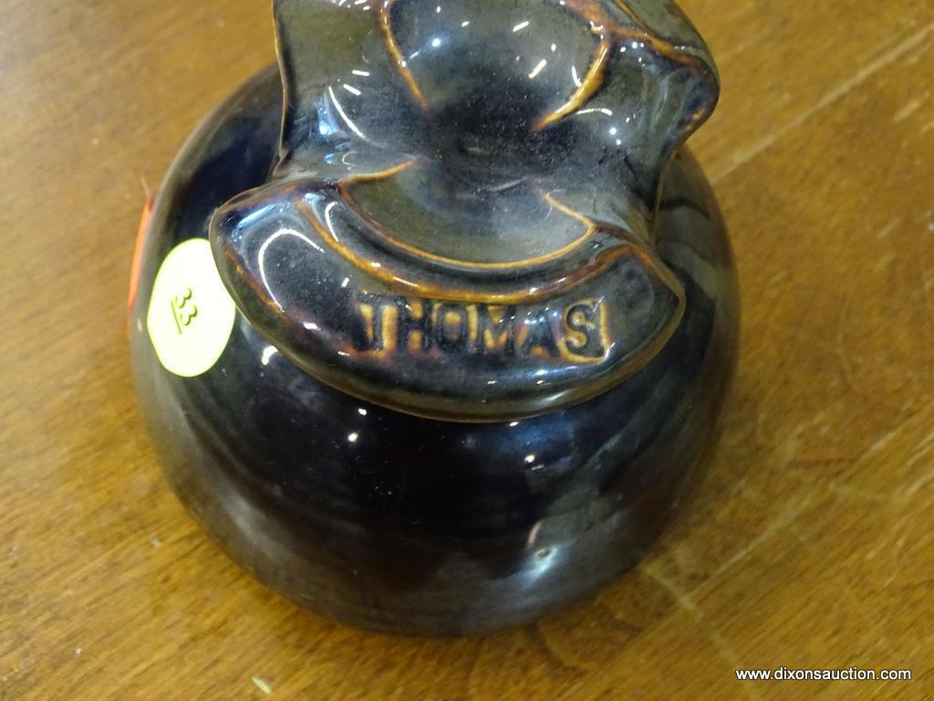 LOT OF 3 INSULATORS; 1 BROWN IN COLOR AND IS MADE BY THOMAS, 1 IS MADE BY HEMINGRAY, AND 1 COBALT IN