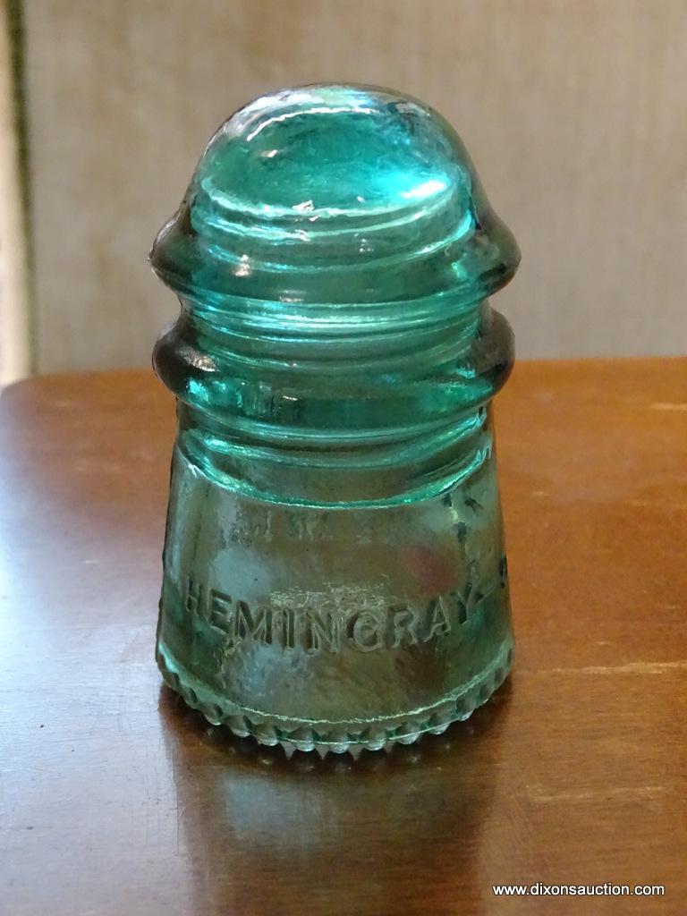 LOT OF 3 INSULATORS; 1 BROWN IN COLOR AND IS MADE BY THOMAS, 1 IS MADE BY HEMINGRAY, AND 1 COBALT IN