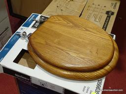 AQUASOURCE TOILET SEAT; OAK WOOD TOILET SEAT. FITS ALL ROUND BOWLS. 16.5 IN. MODEL NO. 0566351. NEW