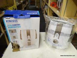 (R7) HOMEDICS TOTALCOMFORT HUMIDIFIER. HAS A 1.4 GALLON TANK, A 65 HOUR RUN TIME AND WORKS FOR LARGE