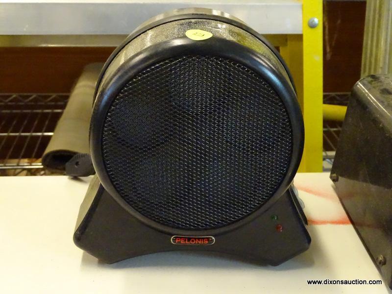 (R4) PELONIS HONEYCOMB DISC FURNACE V. HAS AN ADJUSTABLE TEMPERATURE. MODEL NO. HC-461.