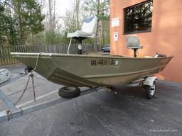 A 2004 Lowe Model L1448M 14 FT. Jon Boat with Venture Single Axel Boat Trailer. Vin #LWCJ0673E404.