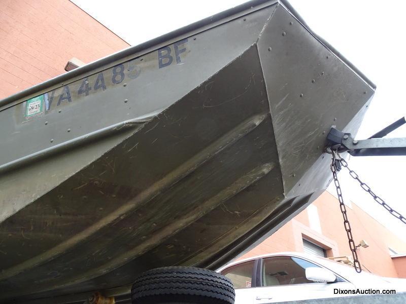 A 2004 Lowe Model L1448M 14 FT. Jon Boat with Venture Single Axel Boat Trailer. Vin #LWCJ0673E404.