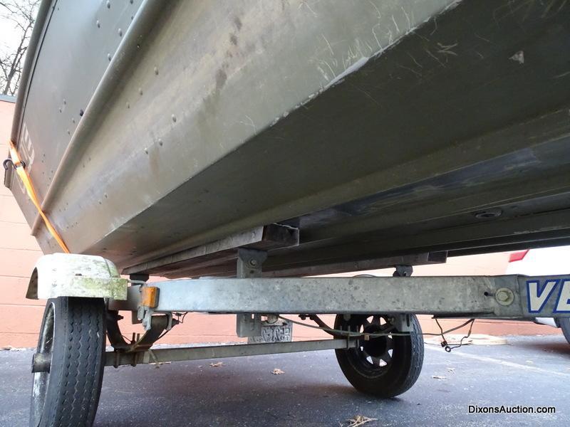 A 2004 Lowe Model L1448M 14 FT. Jon Boat with Venture Single Axel Boat Trailer. Vin #LWCJ0673E404.