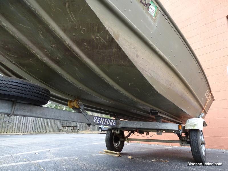 A 2004 Lowe Model L1448M 14 FT. Jon Boat with Venture Single Axel Boat Trailer. Vin #LWCJ0673E404.