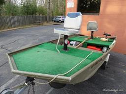 A 2004 Lowe Model L1448M 14 FT. Jon Boat with Venture Single Axel Boat Trailer. Vin #LWCJ0673E404.