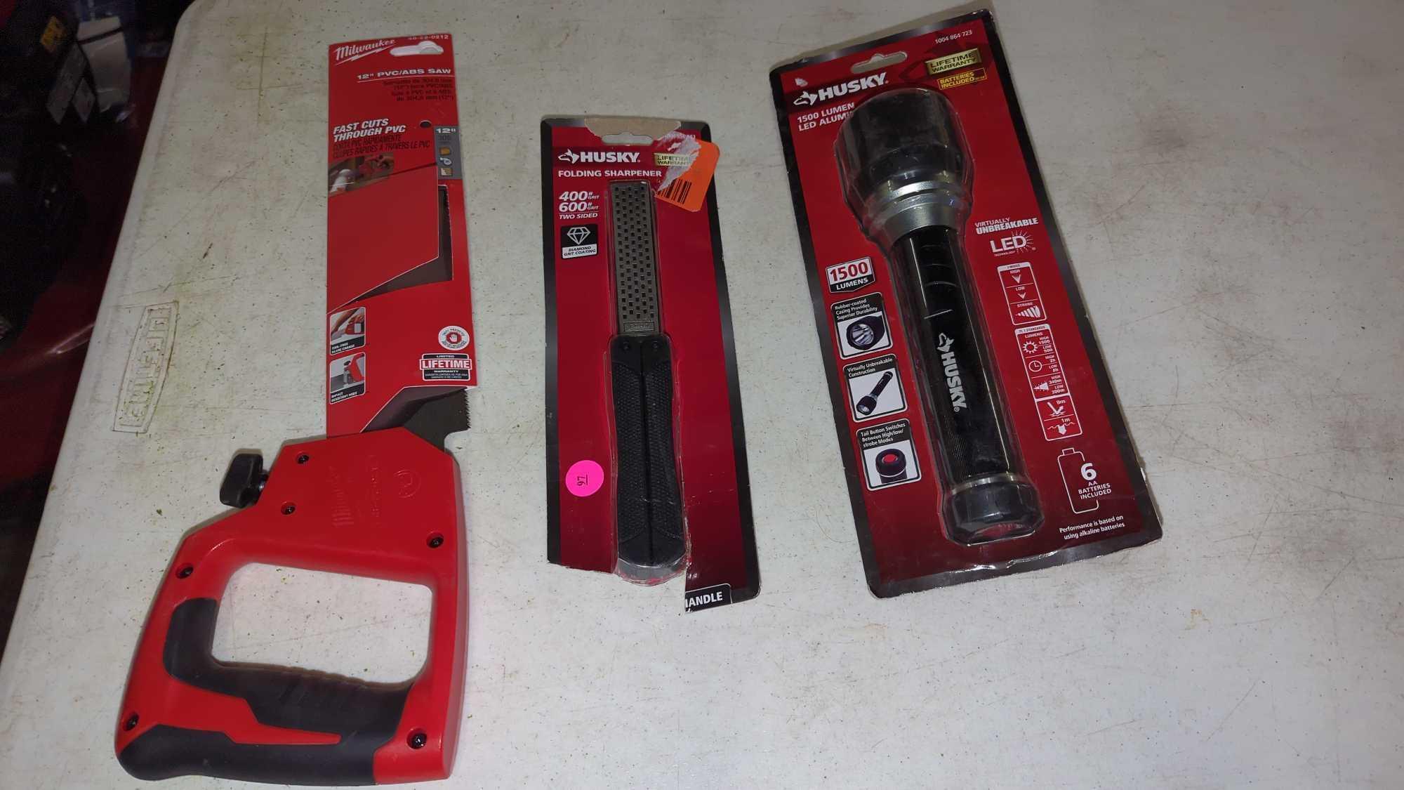 LOT OF 3 TOOLS TO INCLUDE, A MILWAUKEE 12 INCH PVC/ ABS SAW NEW IN THE PACKAGE, A HUSKY FOLDING