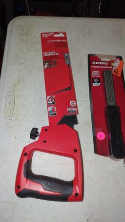 LOT OF 3 TOOLS TO INCLUDE, A MILWAUKEE 12 INCH PVC/ ABS SAW NEW IN THE PACKAGE, A HUSKY FOLDING