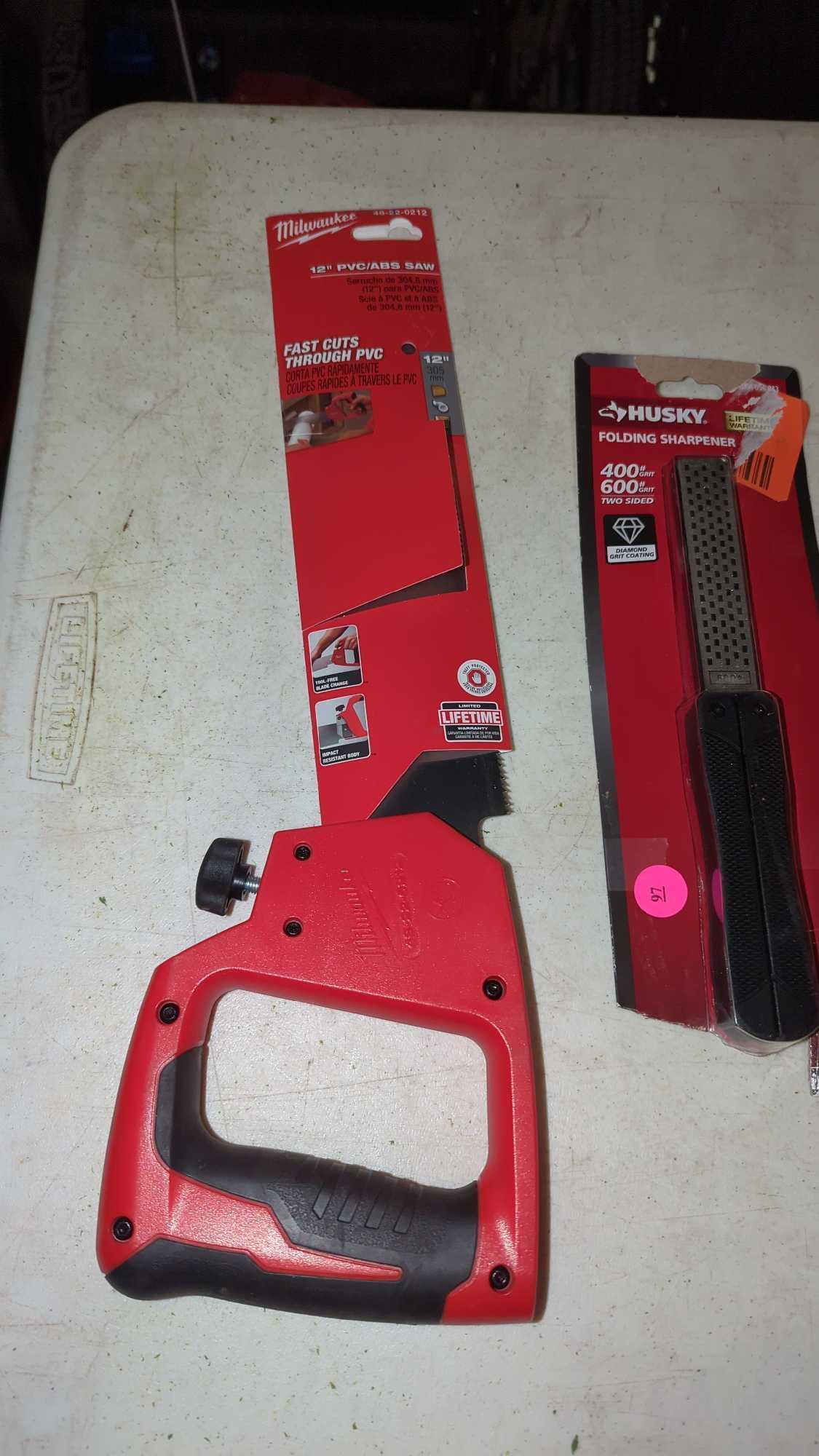 LOT OF 3 TOOLS TO INCLUDE, A MILWAUKEE 12 INCH PVC/ ABS SAW NEW IN THE PACKAGE, A HUSKY FOLDING