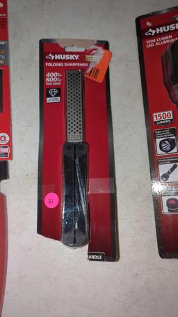 LOT OF 3 TOOLS TO INCLUDE, A MILWAUKEE 12 INCH PVC/ ABS SAW NEW IN THE PACKAGE, A HUSKY FOLDING