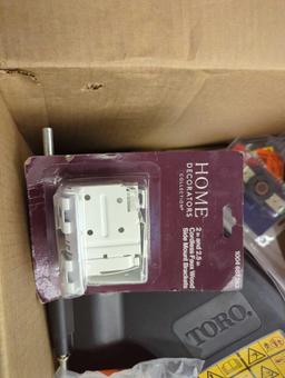 Box Lot including Toro Grass Shooter, Home Decorators Collection 2" and 2.5" Cordless Faux Wood Side