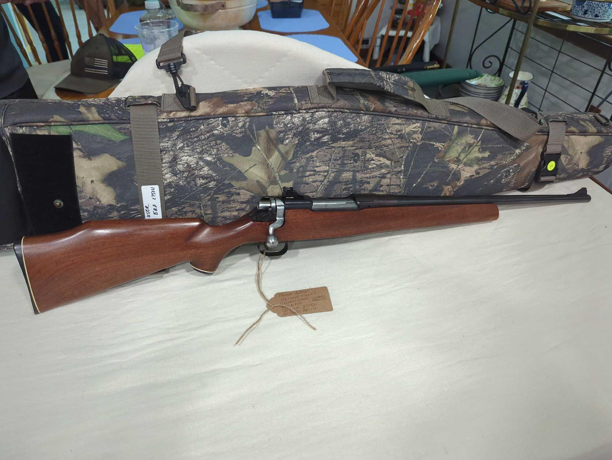 Mauser action 444 caliber Marlin bolt action with wooden stock. McCowen barrel. Williams peepsite.