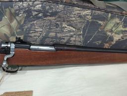 Mauser action 444 caliber Marlin bolt action with wooden stock. McCowen barrel. Williams peepsite.