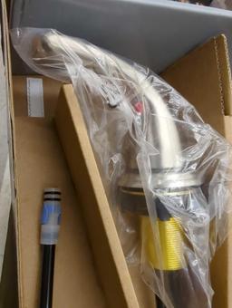 Glacier Bay Builders 8 in. Widespread Double-Handle High-Arc Bathroom Faucet in Brushed Nickel.