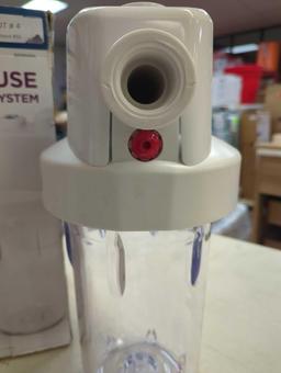 GE Whole House Water Filtration System. Comes in opened box as is shown in photos. Appears to be