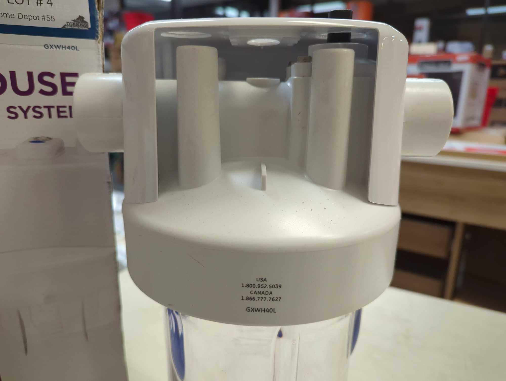 GE Whole House Water Filtration System. Comes in opened box as is shown in photos. Appears to be