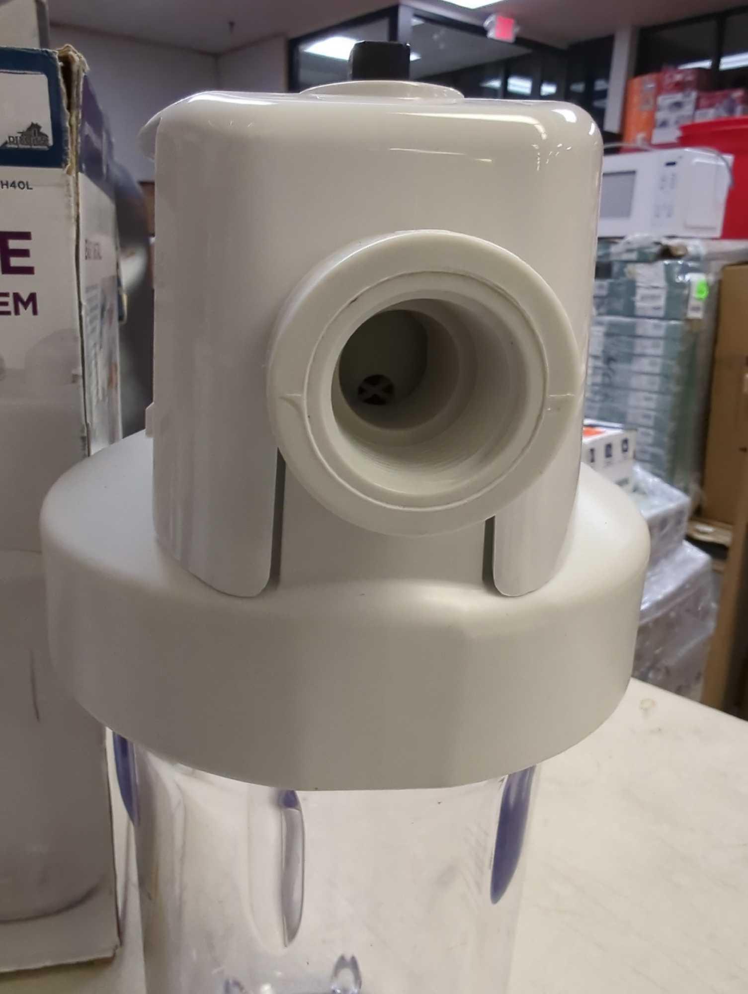 GE Whole House Water Filtration System. Comes in opened box as is shown in photos. Appears to be