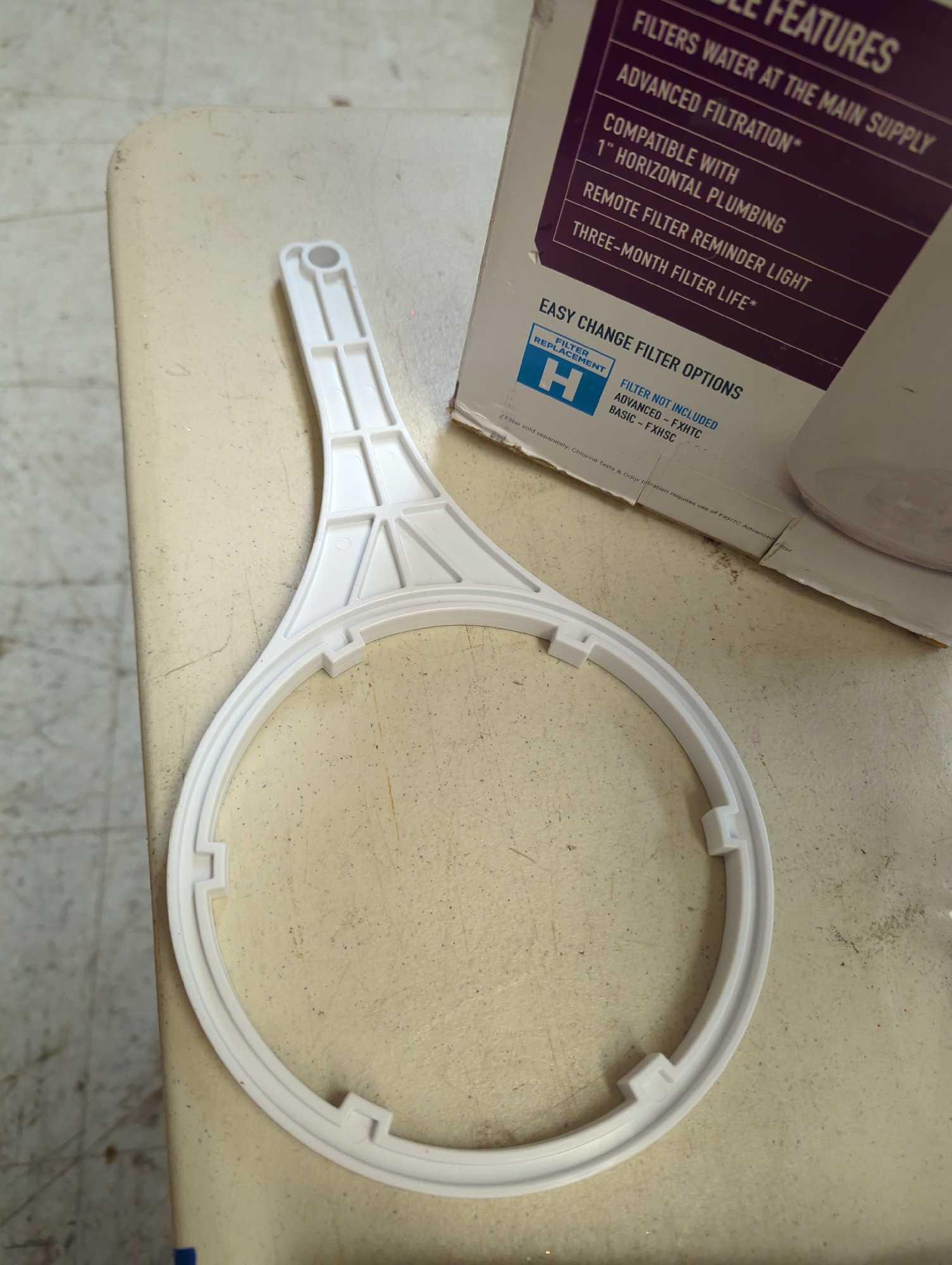 GE Whole House Water Filtration System. Comes in opened box as is shown in photos. Appears to be