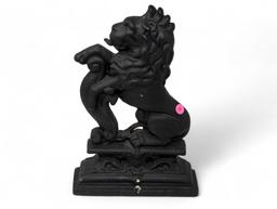 (LR) ANTIQUE CAST IRON MITTAGONG LION DOOR STOP. VERY HEAVY. IT MEASURES APPROX. 9-3/4"W X 2-1/2"D X