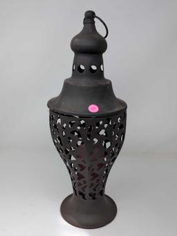 (LR) PUNCHED TIN DECORATIVE CANDLE HOLDER WITH PINK GLASS CANDLE HOLDER INSERT. IT MEASURES APPROX.