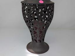 (LR) PUNCHED TIN DECORATIVE CANDLE HOLDER WITH PINK GLASS CANDLE HOLDER INSERT. IT MEASURES APPROX.