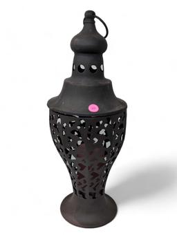 (LR) PUNCHED TIN DECORATIVE CANDLE HOLDER WITH PINK GLASS CANDLE HOLDER INSERT. IT MEASURES APPROX.