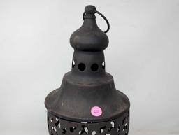 (LR) PUNCHED TIN DECORATIVE CANDLE HOLDER WITH PINK GLASS CANDLE HOLDER INSERT. IT MEASURES APPROX.