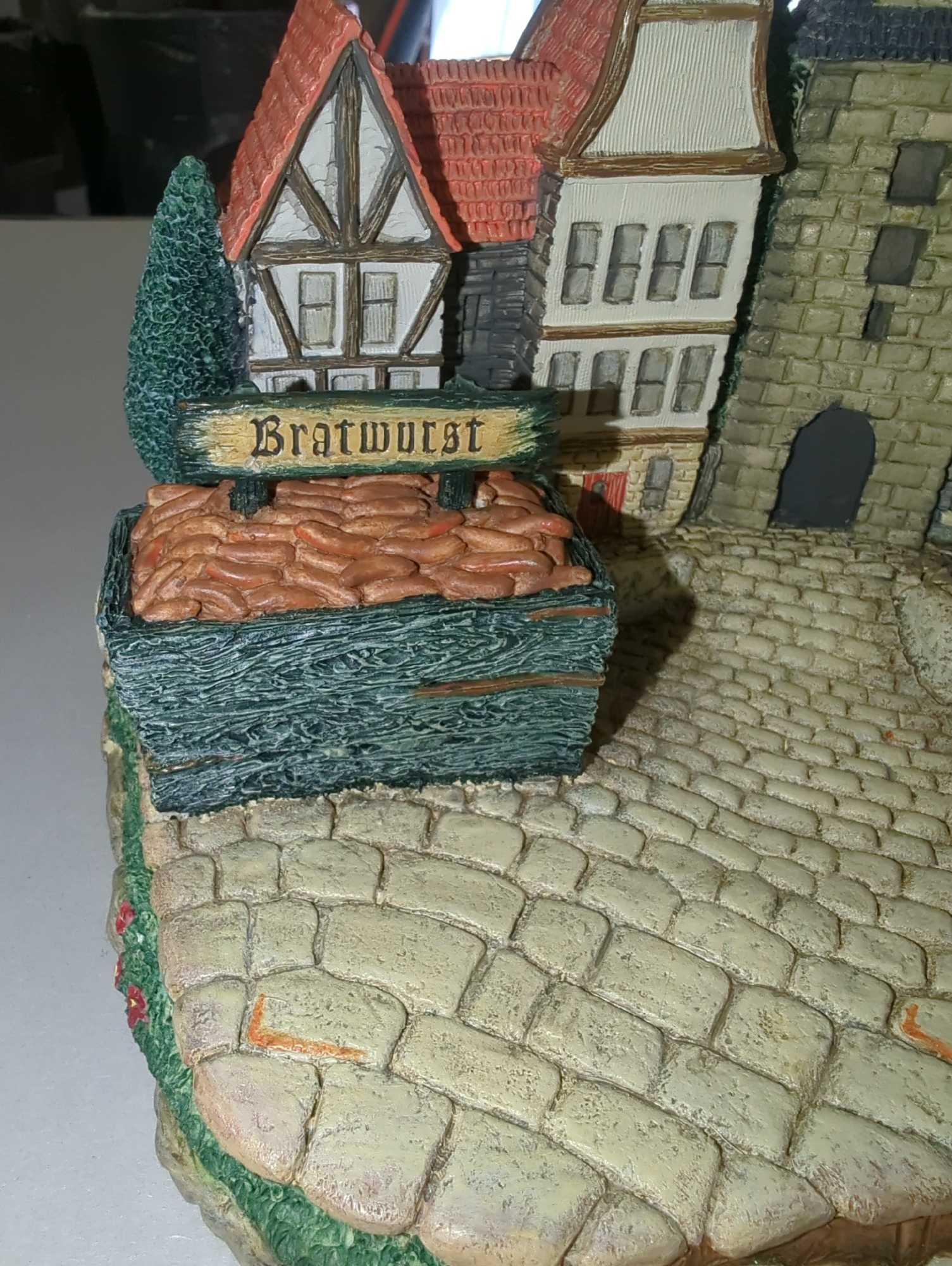 1996 Hummelscape Around The Town #939-D, Measure Approximately 7.5 Inches Tall. Retail Price Value