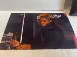Autographed photo of Mary J. Blige with certificate of authenticity. 8x10.