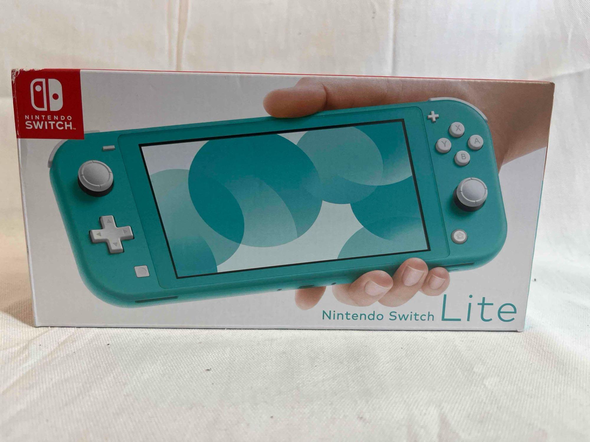 Nintendo Switch Lite including console, matching carrying case, earbuds with box.