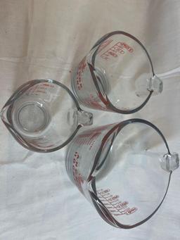 Set of glass Anchor Hocking measuring bowls: 1 cup, 2 cup, 4 cup....