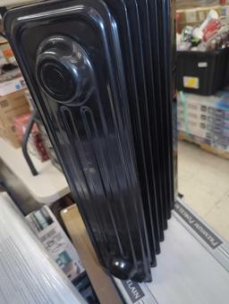 Pelonis 1,500-Watt Oil-Filled Radiant Electric Space Heater with Thermostat, Retail Price $55,